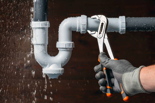 Professional Drain Cleaning technician working in Utica, NY